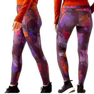 Athleta Rainier Printed Tight. Size XL. Beautiful dark floral print.
